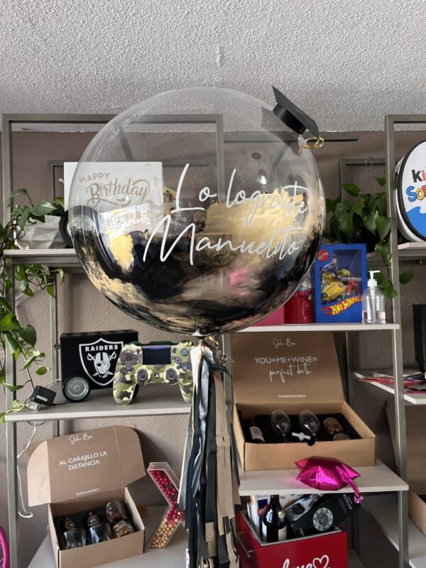 Burbuja mediana con birrete negra y dorado